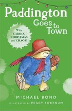 Paddington Goes To Town Paperback  by Michael Bond