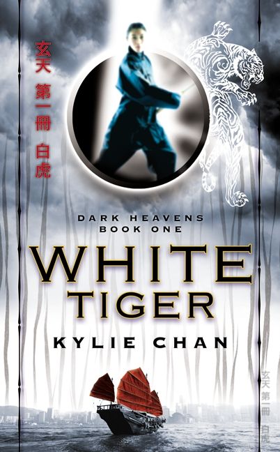 White Tiger: a woman poses in a martial arts stance above the title that hovers over a junket