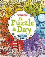 Puzzle A Day Paperback  by Phillip Clarke